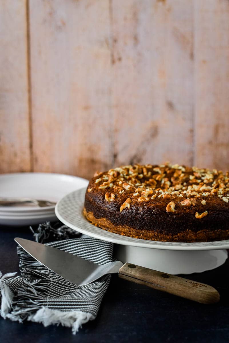 armenian nutmeg cake on white cake stand