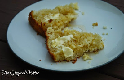 Sourdough Cornbread (The Gingered Whisk) piece of sourdough cornbread split open with honey and butter on plate