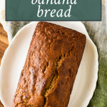 overhead view of sourdough banana bread loaf, with text overlay of recipe name for pinterest